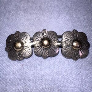 Vintage Navajo silver brooch hand-stamped flowers with gold-wash domes